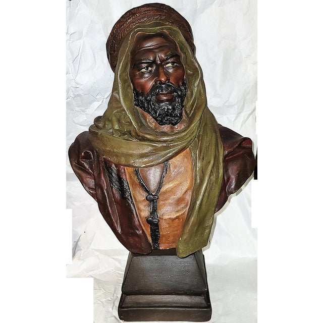 Beautifully paint decorated terracotta near-lifesized bust of a Nubian man after the original by Joseph Le Guluche,...