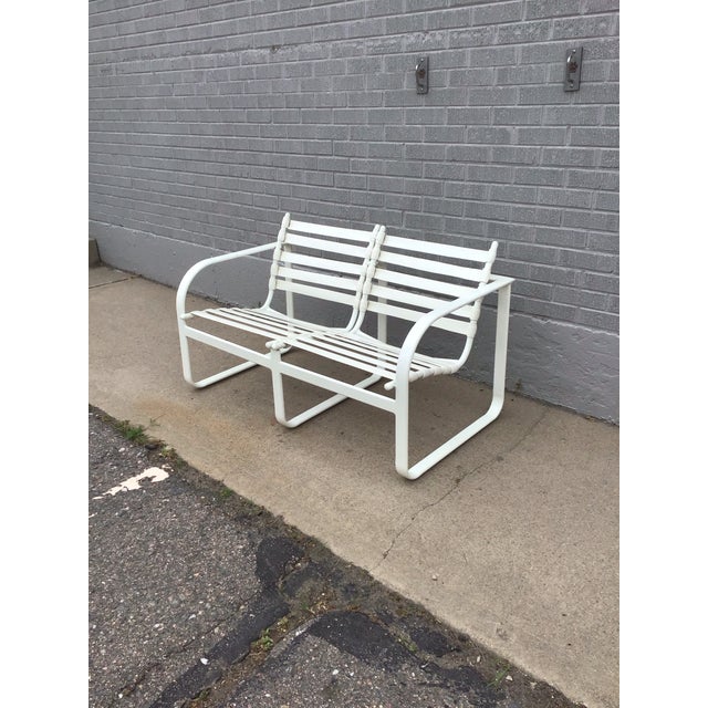 A striking example of Jordan Brown’s sculptural approach to modern furniture design, this elegant loveseat features a...