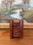 This antique likely burl wood bookend is a cleverly designed functional object featuring a hidden storage compartment....
