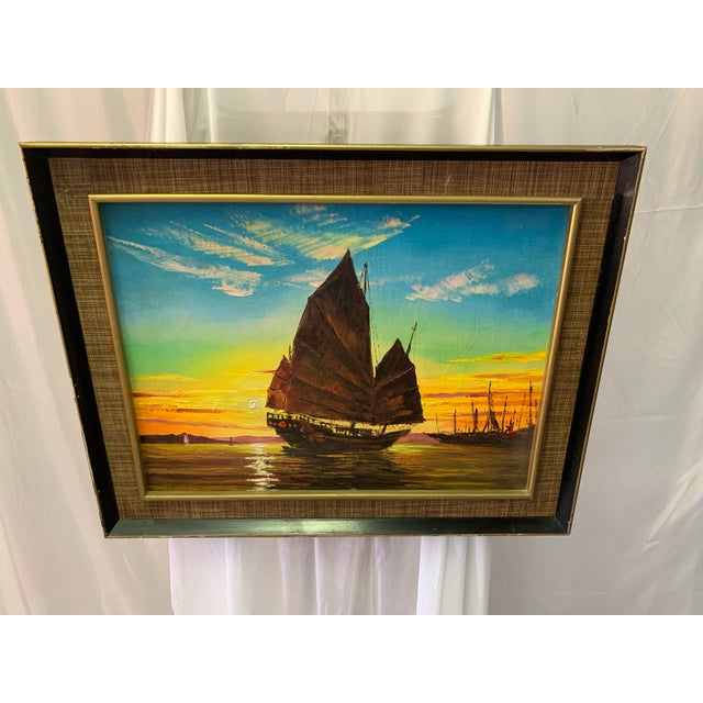 Let the colors of this vintage oil painting envelope you as the scene of a Chinese sailing ship at sea comes to life...