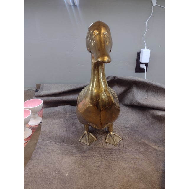 Very large and heavy brass goose figurine. This piece is a wonderful addition to your room's decor. This piece is Mid...