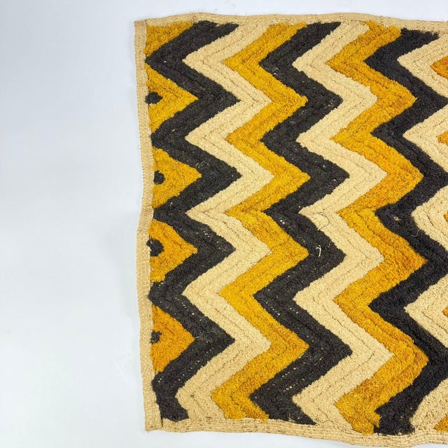 Handwoven Shoowa square textile from the Kuba peoples of the central Democratic Republic of the Congo. Known for their...