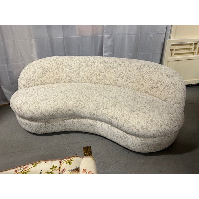 Chic 20th Century Kagan style curved sofa which can be used as found or upholstered in your fabric choice. 35" depth at...