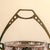This unique centerpiece embodies the geometric and structural design characteristic of the Arts & Crafts movement and the...