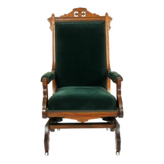 Antique Eastlake Carved Walnut Platform Rocking Chair With Green Velvet Upholstery For Sale
