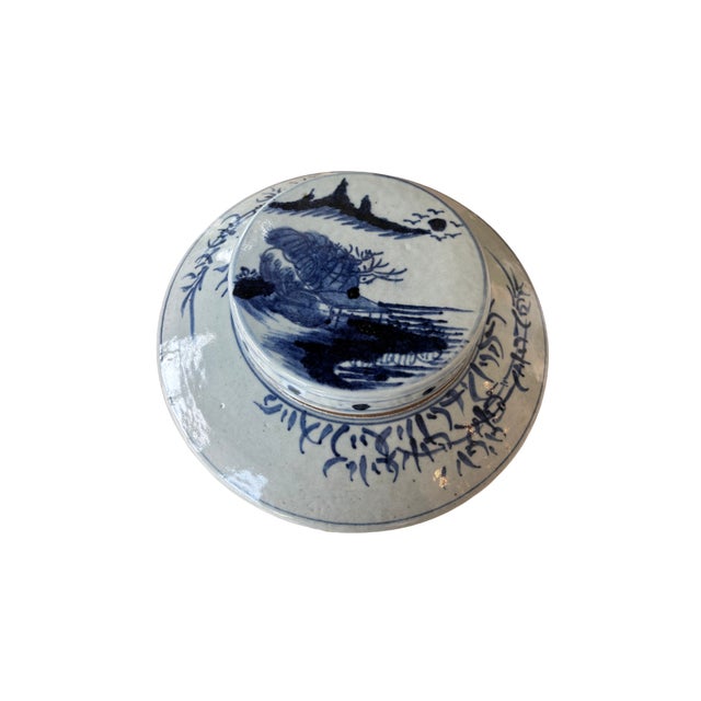 This large Legend of Asia Dynasty tea jar is a hand-painted, high-fired blue and white porcelain vessel. It features...