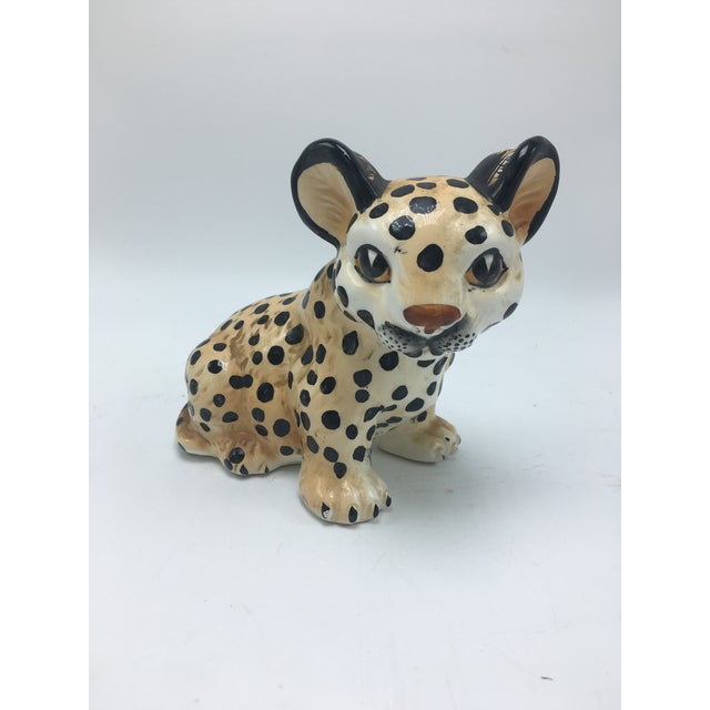 Charming ceramic leopard, this sweet face will bring a smile. Vintage and chic