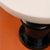 A pair of sculptural side tables or pedestals, crafted in the bold aesthetic of radical 1980s postmodern design. Each...