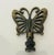 Vintage bronze butterfly lamp finial.