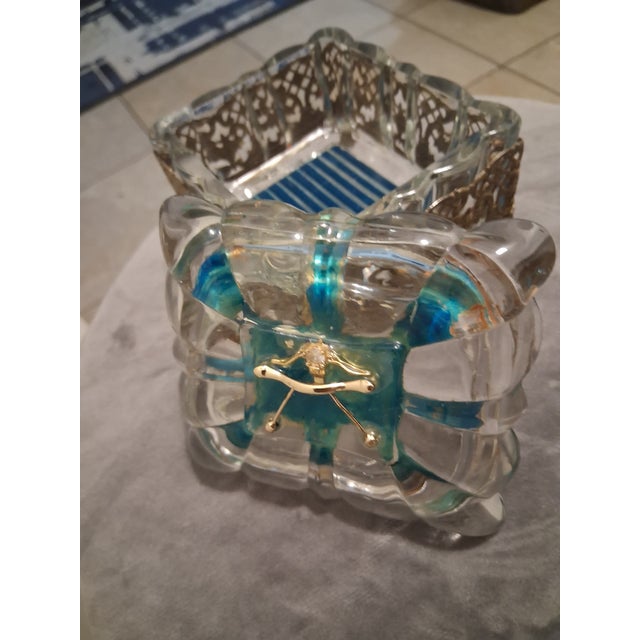 A stunning functional sculpture from the Splendidus Series, "The Splendid Relic Box" transforms a classic glass vitrine...