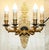 Gold plated four candle branch lion's head bronze wall sconces. Materials:- bronze components casting finish:- polished 24...