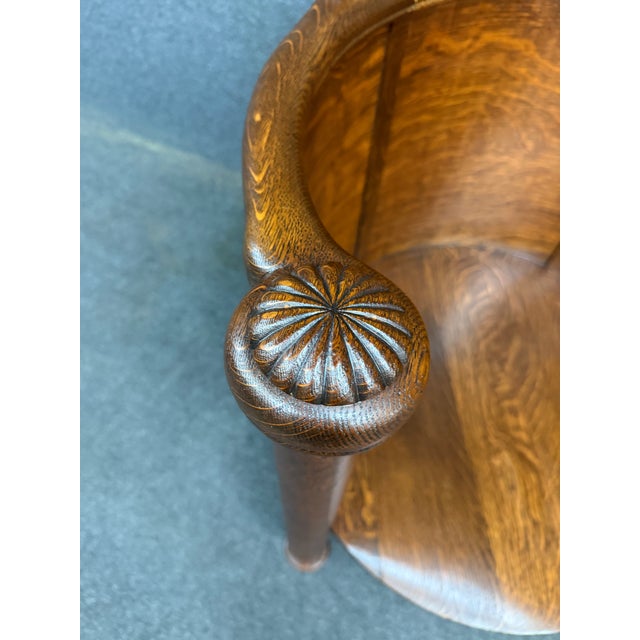 Striking Victorian chair crafted from quarter-sawn oak with pronounced figuring throughout. The chair features a curved...