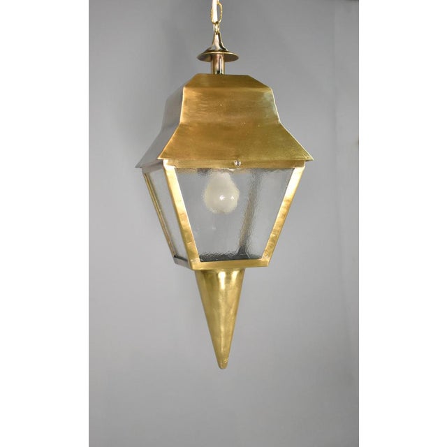 French Antique Exterior Bronze Lantern This large French Exterior Bronze Lantern hangs from a turret top with a sloping...