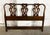 This Drexel 18th Century Collection headboard features a rich wood finish with an openwork back showcasing graceful...