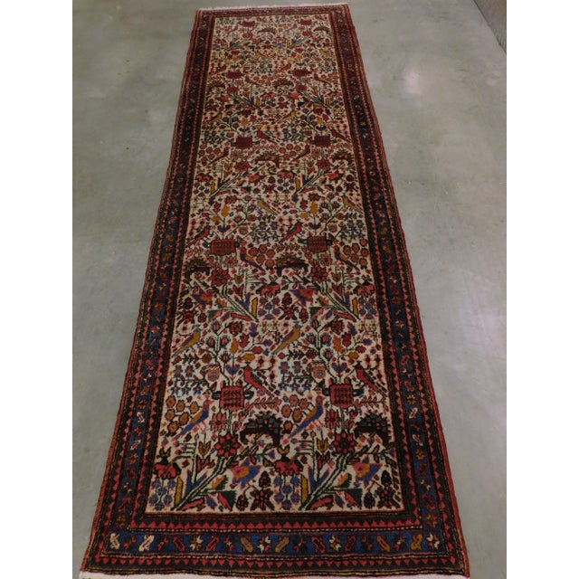 Flowers and nightingales on a beige background. Wool pile on cotton foundation. 3'x 9'