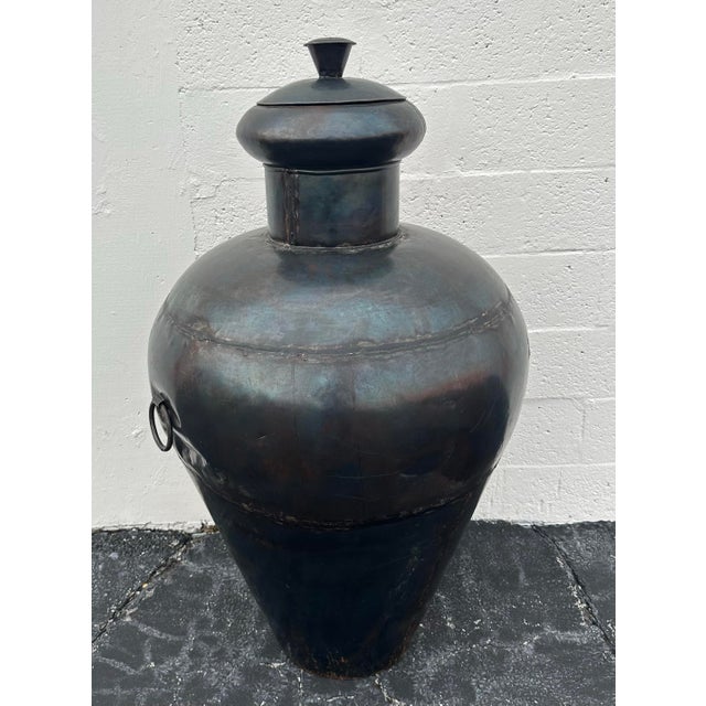 Monumental iron metal pot from India. Great to display indoor or outdoor a statement piece very large with age patina....
