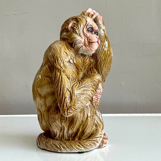 A wonderfully whimsical and expressive vintage sculpture, this ceramic monkey is brimming with personality and charm....