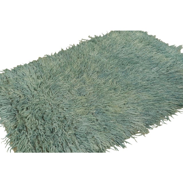 Hand-knotted in wool, this 4x6 vintage Tulu rug, circa 1950-1960, is among the family of Tulus with quite a rare colorway...