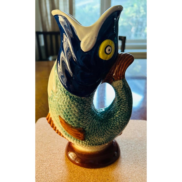 VINTAGE Sigma CERAMIC MULTI-COLOR GLUGGLE JUG MADE IN PORTUGAL.2 tiny chips on bottom of pitcher. Cannot see at all when...