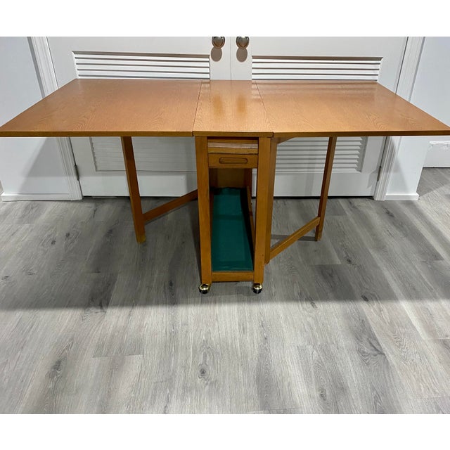 Vintage MidCentury DropLeaf Table on Casters With 4 Hideaway Chairs