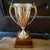 1960s Classic Gold-Tone Metal Loving Cup Trophy Mounted on a Tiered Walnut Wood Base. For Sale - Image 5 of 13