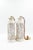 Pair of cylindrical white ceramic pendant lights, with an allover pierced lattice of geometric forms and cut-out cherry...