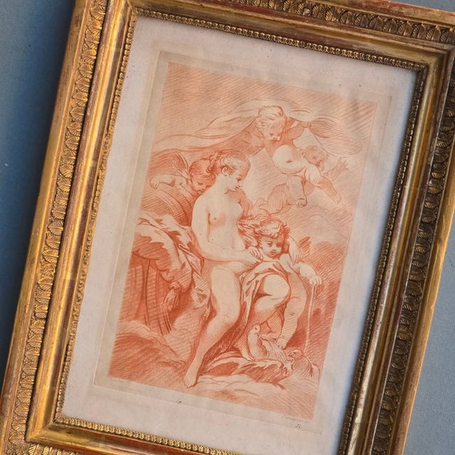 Venus with cupines the sensual grace of rococo is revived in this sanguine, where myth meets the refinement of crayon. an...