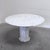 Remarks: Mid century round dining table, 1970s. White marble table top and base. Table is good condition. One chip, see...