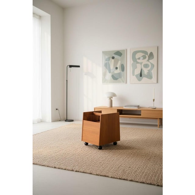 That combines function with classic Scandinavian design. The stand is on wheels, making it easy to move around as needed....