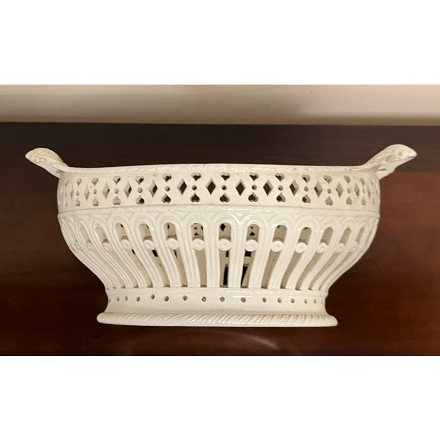 Antique 18th century George III creamware basket with intricate pierced sides and foliate handles. Measures 10 1/4" x 5...