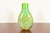 A gorgeous Italian Murano glass vase featuring a distinctive Millefiori pattern with lime green and red swirls By Ann...