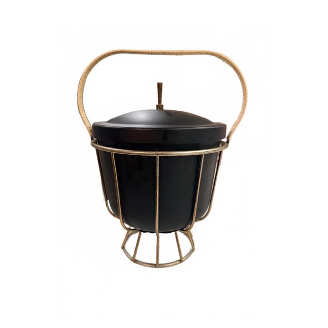 Elevate your home bar or bar cart with this striking, authentic 1950s/1960s Mid-Century Modern ice bucket. This highly...