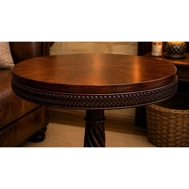 Mahogany book-matched flame grain table. 75-90 years old. Georgian spiral carved tripod legs. Braided leather border,...