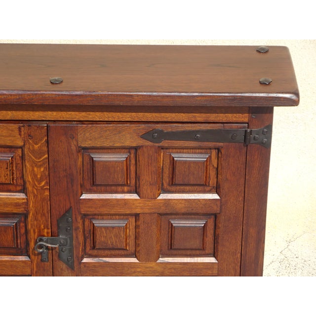 A very shallow cabinet, ideal for a hallway or limited space. Traditionally crafted in the 1950s from solid oak. The 3 cm...