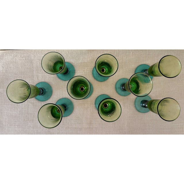Set of 11, hand blown glass, Galleria Champagne Flutes from Anthropologie with green optic swirl cups and pink and blue...