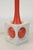 A lamp of wood painted orange and white, circa 1960, midcentury design. European Plug (up to 250V).The wiring of this item...
