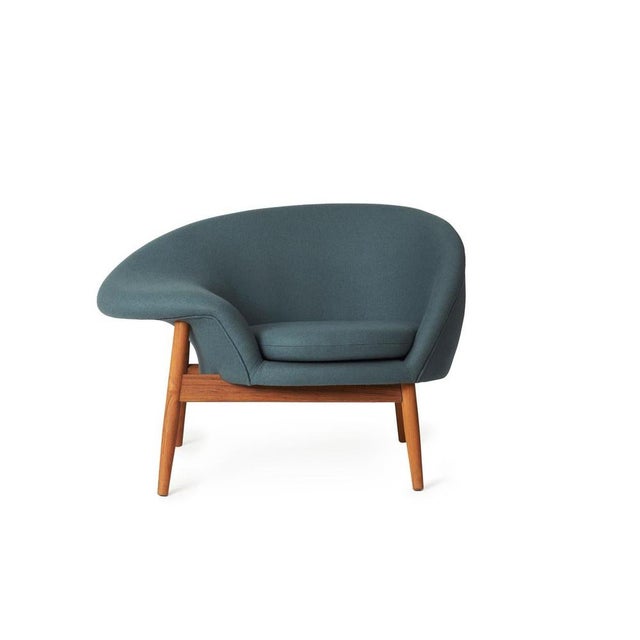 Fried egg left lounge chair petrol by warm nordic dimensions: d 99 x w 68 x h 68 cm material: textile or nubuck...