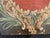 A striking antique Italian hand-painted decorative panel featuring a classical heraldic cartouche surrounded by scrolling...