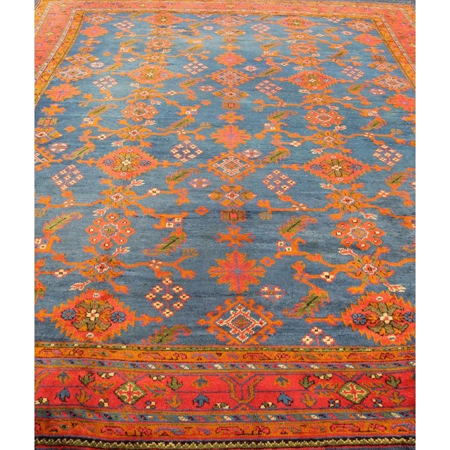 Red Early 20th Century Antique Turkish Oushak Rug in Vibrant Blue Red Green With All-Over Design For Sale - Image 8 of 12