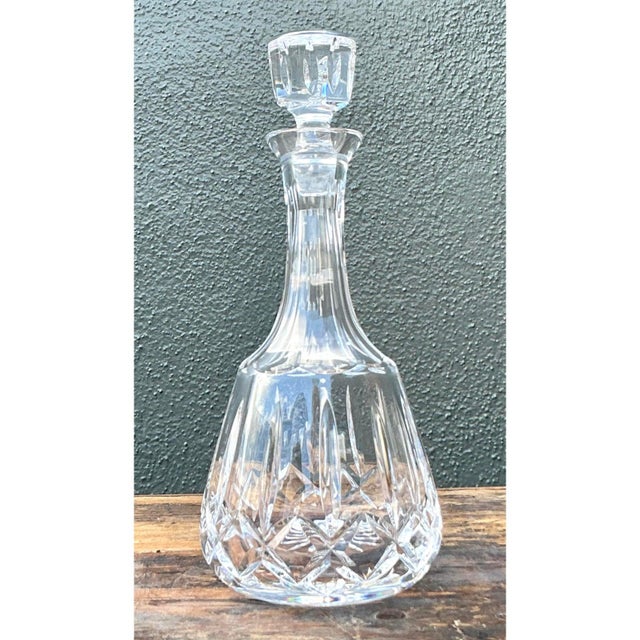 Elevate your home bar setup with this dazzling vintage cut crystal decanter, a piece that perfectly captures the...
