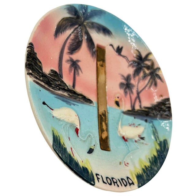 Mid-century pink and green 3d sculptural ceramic California pottery flamingo theme beach Plate. The wall plate features a...