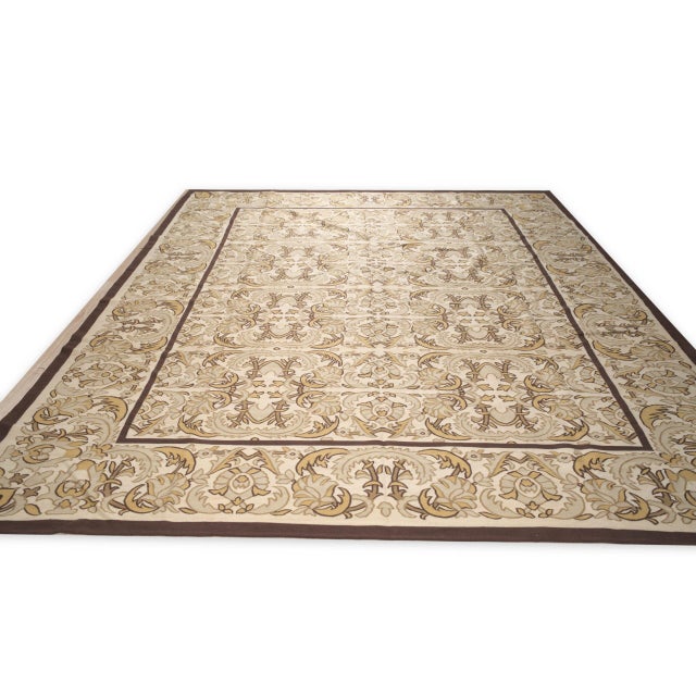 Vintage Aubusson with an all-over Renaissance scroll design. Rows of mirrored acanthus scrolls in gold, taupe and brown...