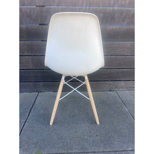 As New White Eames Chair was used as a desk chair Ray Eames adapted molding techniques developed during World War II to...