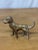 A delightful diminutive brass dog in vintage English brass. Lovely detail. Hand selected in and imported from England.