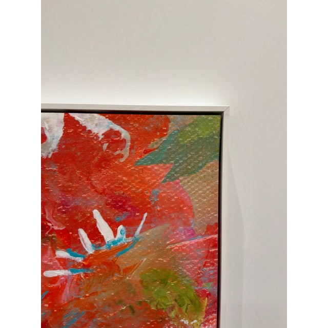 Soicher Marin Red Blooms Canvas. Artist enhanced, blooming red flowers. White frame. Original retail $1380. Showroom floor...