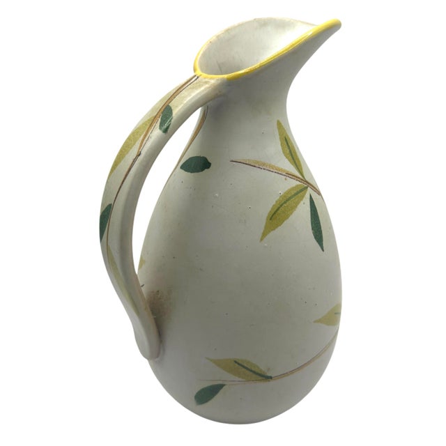 Ceramic Italian Pitcher Vase hand-painted bird sitting on a limb. The bottom of the vase has 6511 Italy.