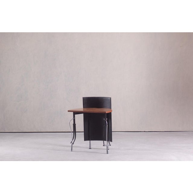 The ‘La Vuelta’ desk was designed by British designer Perry King and Spanish designer Santiago Miranda in 1986 for the...