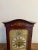 Antique Edwardian quality mahogany inlaid chiming 8 day mantle clock having a quality mahogany inlaid case, a single...