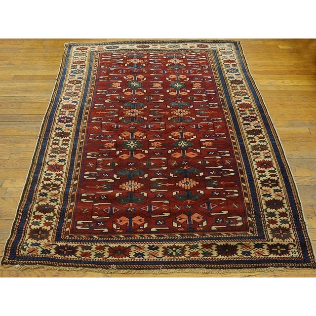 Antique Caucasian - Kuba Rug, Size: 4' 2''x 5' 10''. This nineteenth-century Caucasian Kuba rug is a superlative example...