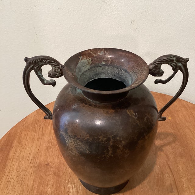 This Vintage Roman Style Amphora Vase/Urn with Jaguar Ornate Handles features a weathered patina finish that adds to its...